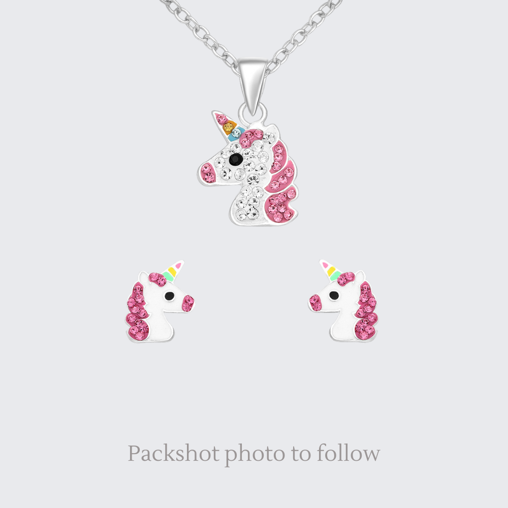 Unicorn-shaped necklace and earrings on a light gray background