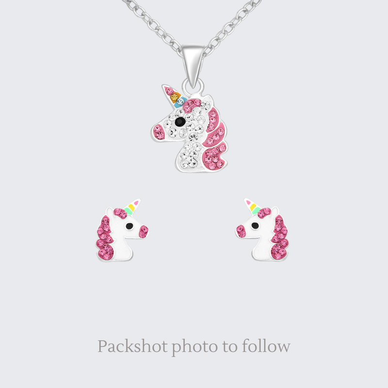 Unicorn-shaped necklace and earrings on a light gray background