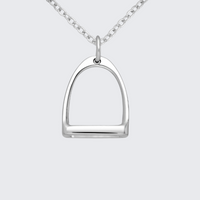 Silver equestrian stirrup pendant on a chain against a light gray background