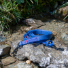 Blue PVC Dog leash on rocky watery surface - fetlox 