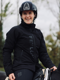 Girl wearing stride performance coat on a horse - fetlox 
